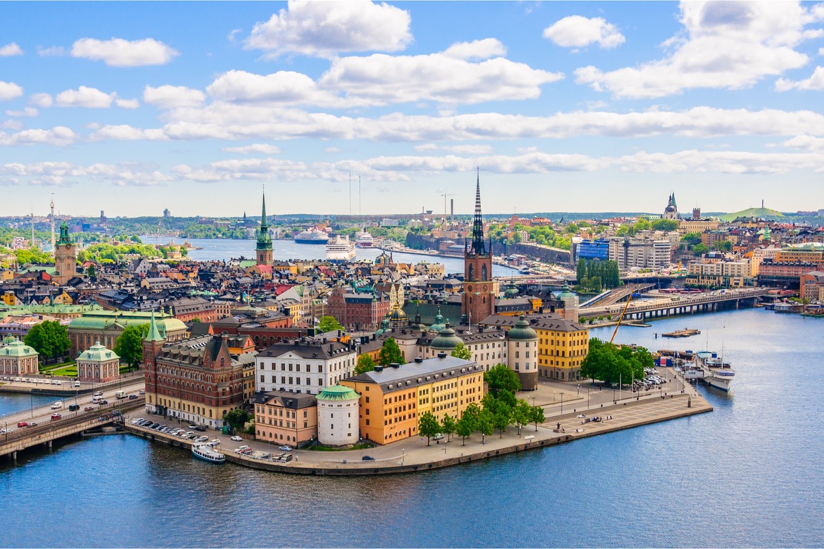 Aerial view of Stockholm's old town Gamla Stan with Riddarholmen Church at sunset